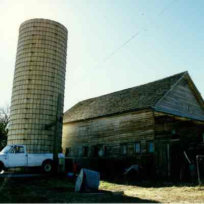 Brunner Property with a Silo, Car, and Building