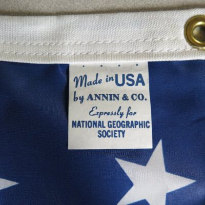 Tag on flag: Origsize: 38" (w) x 62" (l); Origformat: Artifact