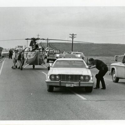 "Flight for Life" helicopter and police car at an accident, circa 1976: Origsize: 5" x 7"; Origformat: Print-Photographic; Resolution: 725dpi