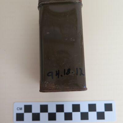 Back of tin: Origsize: 5" (h) x 1.75" (w) x; Origformat: Artifact