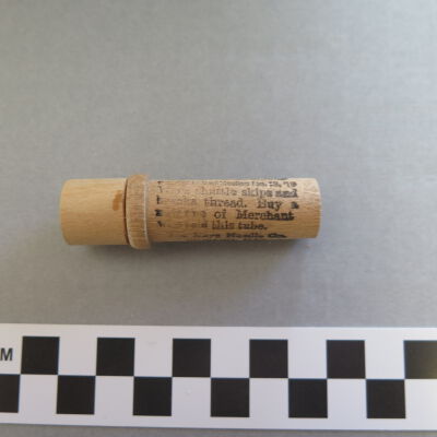 Continued text on side of case.: Origsize: 2.5" (h) x 0.75" (di; Origformat: Artifact