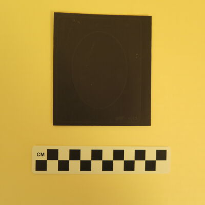 Back of magnet.: Origsize: 4" (h) x 3.75" (w); Origformat: Artifact