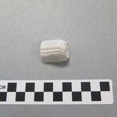 Other side of fragment.: Origsize: 1.25" (h) x 1" (diam; Origformat: Artifact