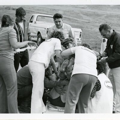 Patient being placed on a stretcher at a car accident, Highway 287
