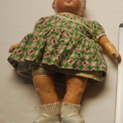 Front of doll: Origsize: 14" (h) x 9"(w) x 4"; Origformat: Artifact