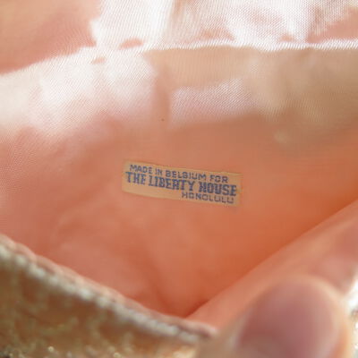 Inside of purse: Origsize: 1" (h) x 3.5" (w) x; Origformat: Artifact