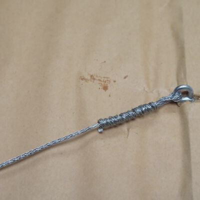 Condition: Staining/accretion near hanging wire at PR side, verso (2018-08-29): Origformat: Artifact