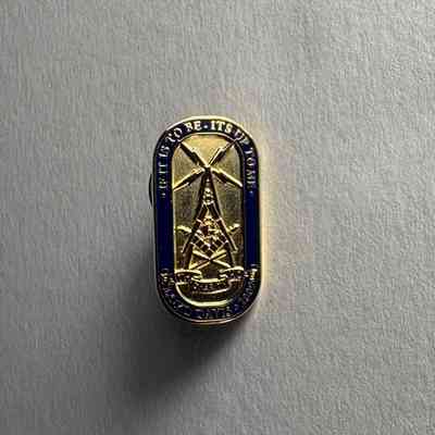 Pin: Lighthouse and square and compass. "Lloyd Davis 2009" Donated by PGM James O. Wood (2009)