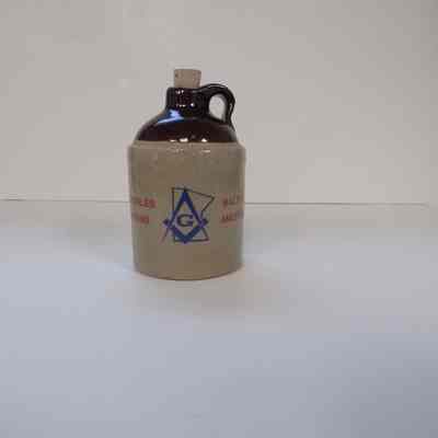 Jug: small commemorative stoneware jug presented by P.G.M. Charles Baltos, G.M. of Minnesota (1992).