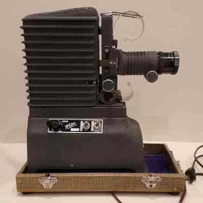 Projector: Whitco 35mm. De Lux. With accompanying box, chord, and instructions. c. Mid 20th century