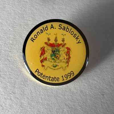 Pin: "Ronald A. Sablosky Potentate 1999" Donated by PGM James O. Wood. (1999)