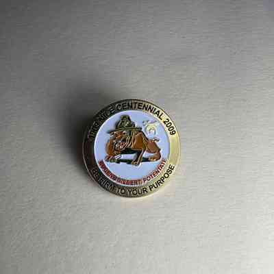 Pin: Bull dog wearing hat with whrine symbols. "1909 Nile Centennial 2009. Donated by PGM James O. Wood (2009)