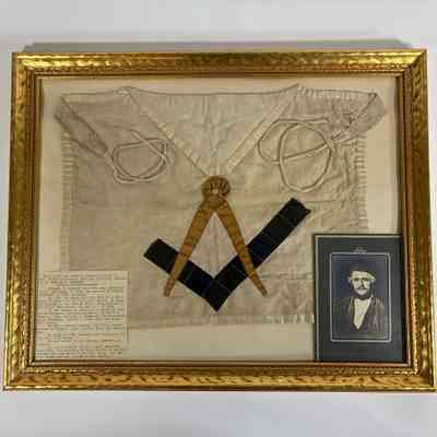 Apron: Framed. Belonged to Michael T. Simmons, first Junior Warden of Olympia Lodge. c. mid-19th century