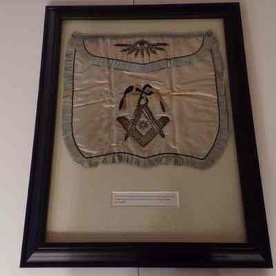 Apron: Framed. Belonged to Most Worshipful David E. Bailey, Master of Olympia Lodge No.1 in 1897.