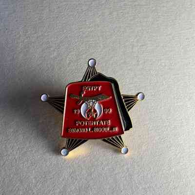 Pin: Red Fez infront of a star. "Egypt 1999 Potentate/Edmond L. Bidoul, Jr." Belonged to PGM James O. Wood.