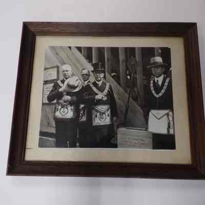 Photograph: Framed, of Masons standing with cornerstone at the cornerstone laying of Chehalis Lodge #28 on June 25, 1932