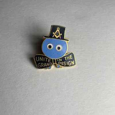 Pin: "Unite in the Grand Design." Donated by PGM James O. Wood (c.1978)