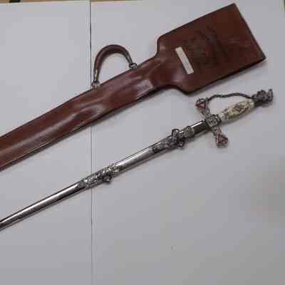Sword, Scabbard, and leather case. "O.R. Devenport, Seattle Comm. No. 2, KT SEattle, WASH."