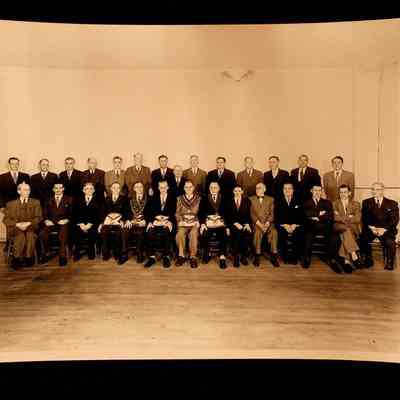 Photograph: In envelope. Masons seated and standing for posed picture. Envelope says "class of 1950". Found in photo with other photographs, various.