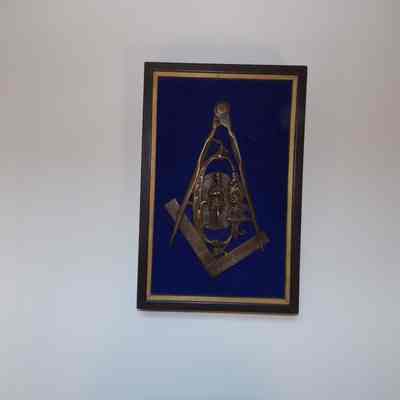 Masonic Symbol: Framed, Bronze on blue felt. Gifted to GM George T. Leslie by Lynn Michelson of H. Upton Naval & Military Lodge. (c. 1904)