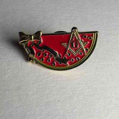 Pin: Watermelon half with square and compass. Found in a cash of pins donated by PGM James O. Wood (c. 1999)