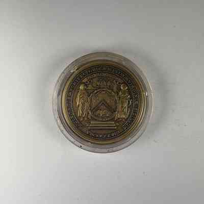 Coin in case: Copper coin in plastic case. Grand Lodge of Virginia Bicentennial. (1978) Belonged to PGM James O.Wood.