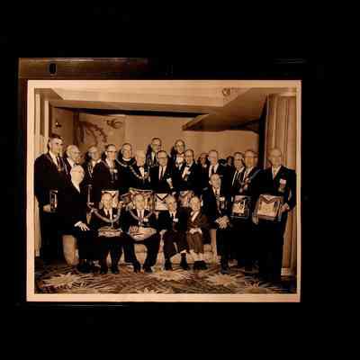 Photograph: black and white Lodge Officers and Canadian visitors. c. mid 20th century.