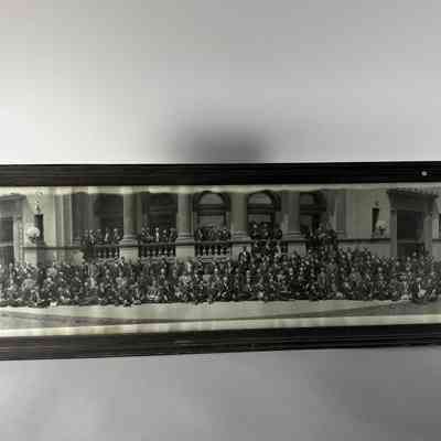 Panorama: Men standing outside of the Masonic Temple in Spokane, Washington. Most all wearing ribbons. c.1920