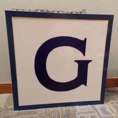 Sign: Large, blue and white, Electric East of a lodge sign "G"