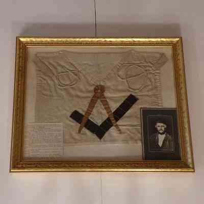 Apron: Framed. Belonged to Michael T. Simmons, first Junior Warden of Olympia Lodge. c. mid-19th century