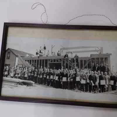 Photograph: Framed photo of Masons and families standing at construction of new masonic site, at dedication of