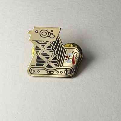 Pin: Shriner. In the shape of a turn of the 20th century camera. Donated by PGM James O. Wood (c.1999)