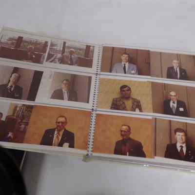 Card was found tucked inside this photo album. Album was voted to be deaccessioned.
