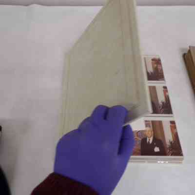 Card was found tucked inside this photo album. Album was voted to be deaccessioned.