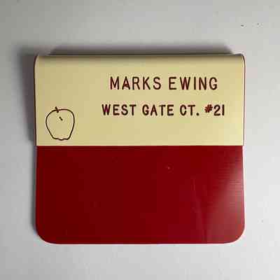 2 Name Tags: White with Red Lettering. "Marks Ewing/West Gate Ct. #21" Amaranth. Late 20th Century.