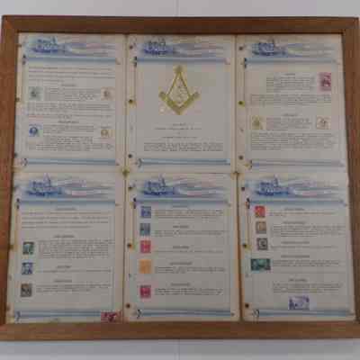 Framed Exhibit: 6 pages displaying stamps of famous masons. "Presented to Chehalis Lodge 28 by Dr. Arthur S. Cory, April 1959"