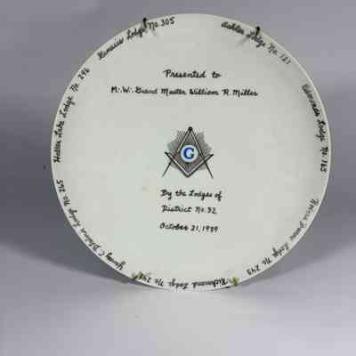 1 Plate: One Ceramic Plate, "Presented to M.W. Grand Master William R. Miller by the Lodges of District No. 32" (1989)