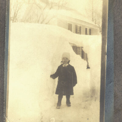 unidentified child in snow bank