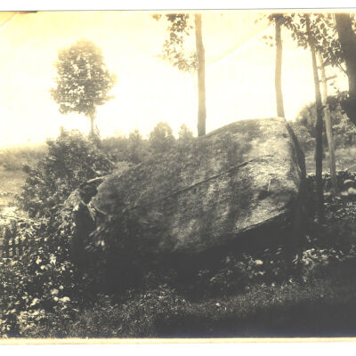 Turtle Rock with woman in formal attire