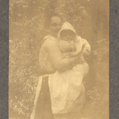 unidentified woman holding baby