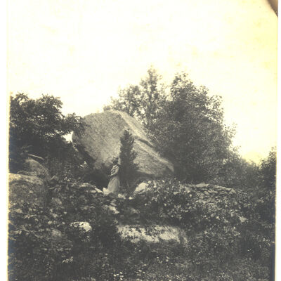 Turtle Rock with woman in formal attire