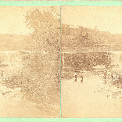 Katonah, waterfall and river with man wading in water