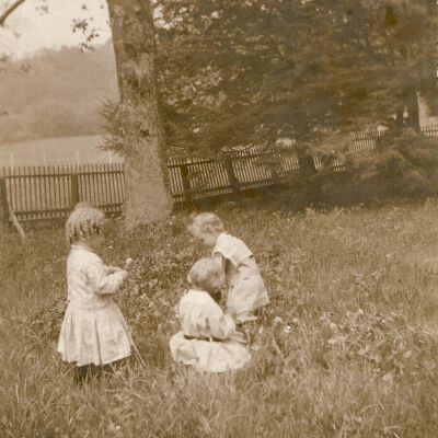 Hope Bedell as a child with two unidentified children
