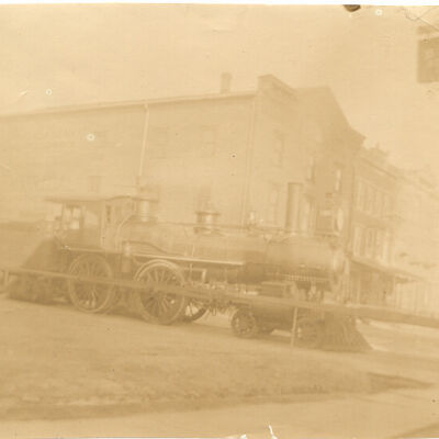 Railroad Depot in Bedford Hills featuring train engine.