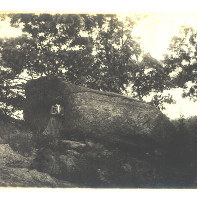 Turtle Rock with woman in formal attire