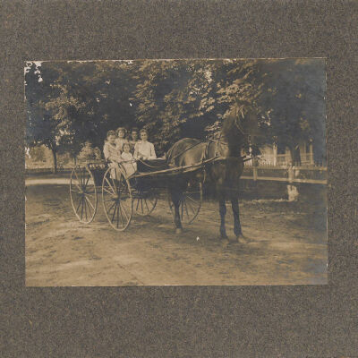 Women & Children on a horse and buggy
