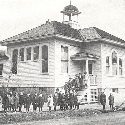 School children outside unknown school house