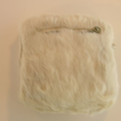 Young Girl's White Fur Muff