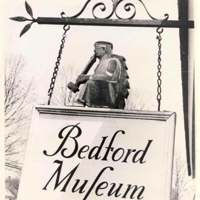 Bedford Museum sign with wooden Indian