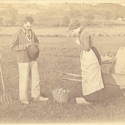 Unknown farmers in field